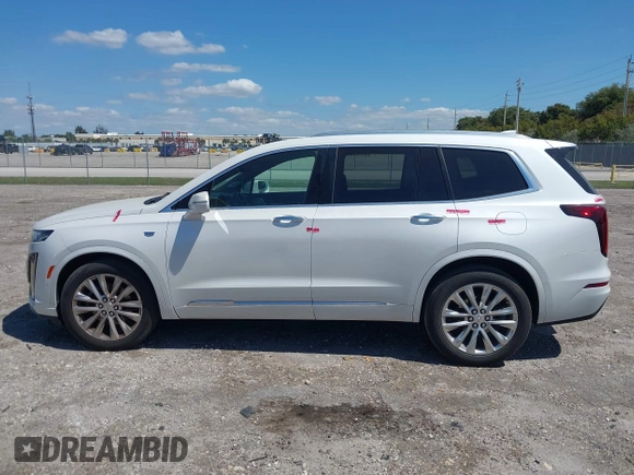 2020 Cadillac XT6 FWD Premium Luxury z VIN 1GYKPCRS1LZ228982, wystawiony jako IAAI lot #41975364 z przebiegiem 84 803 mil mil oraz . Historia ofert i sprzedaży dostępna na DreamBid. Obrazek 13.