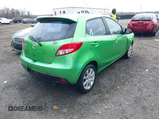 2011 Mazda 2 Sport with VIN JM1DE1HZ1B0119805, listed as a IAAI auction lot 41934481 with 122,679 mi miles. Bid and sale history available at carsss.com. Image 4.