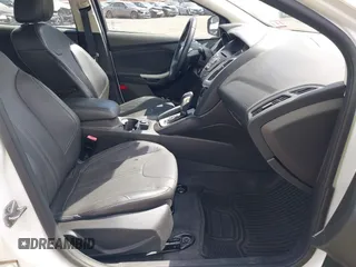 2013 Ford Focus SE with VIN 1FADP3K29DL182434, listed as a IAAI auction lot 42138008 with 103,072 mi miles. Bid and sale history available at carsss.com. Image 5.