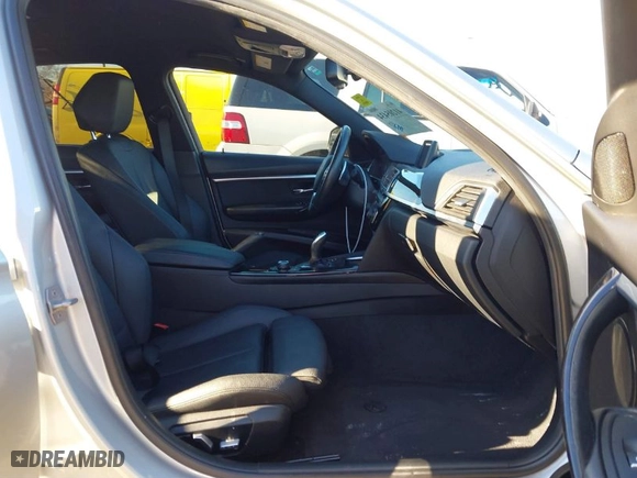 2018 BMW 3 Series 330i with VIN WBA8B9G58JNU97318, listed as a IAAI auction lot 41205434 with 62,582 mi miles. Bid and sale history available at carsss.com. Image 5.
