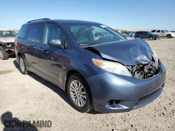2014 Toyota Sienna XLE with VIN 5TDYK3DC5ES467244, listed as a Copart auction lot 54777445 with 157,503 mi miles and Salvage Title. Bid and sale history available at DreamBid. Image 4.
