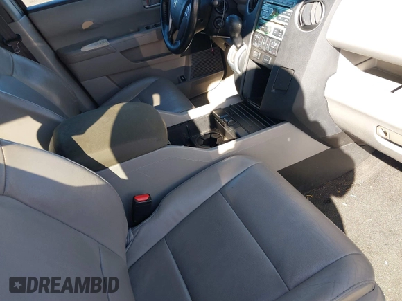2011 Honda Pilot EX-L with VIN 5FNYF4H65BB004213, listed as a IAAI auction lot 41867681 with 157,644 mi miles and . Bid and sale history available at carsss.com. Image 5.