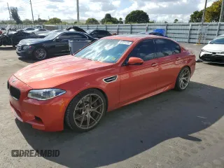 2014 BMW M5 with VIN WBSFV9C58ED097898, listed as a Copart auction lot 86151234 with 60,470 mi miles and Clean Title. Bid and sale history available at carsss.com. Image 1.