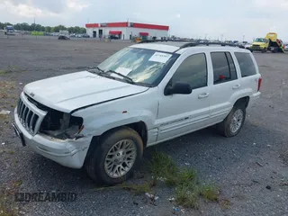 2002 Jeep Grand Cherokee Limited z VIN 1J4GX58N62C195783, wystawiony jako IAAI lot #42745397 z przebiegiem 242 502 mil mil oraz . Historia ofert i sprzedaży dostępna na DreamBid. Obrazek 2.