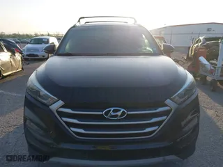 2017 Hyundai Tucson Value with VIN KM8J33A2XHU462806, listed as a IAAI auction lot 42045963 with 102,678 mi miles. Bid and sale history available at carsss.com. Image 12.