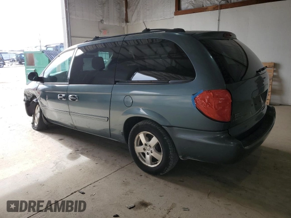 2005 Dodge Caravan SXT with VIN 2D4GP44L95R462451, listed as a Copart auction lot 50413125 with 148,573 mi miles and Salvage title. Bid and sale history available at DreamBid. Image 2.