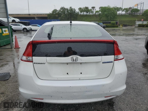 2011 Honda Insight EX z VIN JHMZE2H79BS009016, wystawiony jako Copart lot #59098615 z przebiegiem 136 715 mil mil oraz Szkoda całkowita • Salvage title. Historia ofert i sprzedaży dostępna na DreamBid. Obrazek 6.