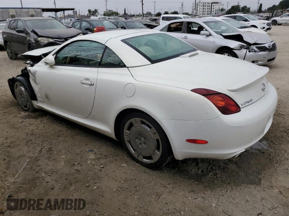 2004 Lexus SC 430 with VIN JTHFN48Y040054660, listed as a Copart auction lot 64510515 with 79,452 mi miles and Salvage title. Bid and sale history available at DreamBid. Image 2.