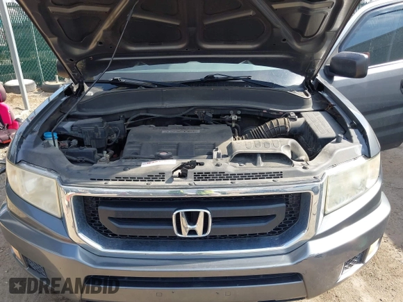 2011 Honda Ridgeline RT z VIN 5FPYK1F26BB453191, wystawiony jako IAAI lot #41776280 z przebiegiem 122 908 mil mil oraz . Historia ofert i sprzedaży dostępna na DreamBid. Obrazek 10.