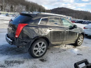 2011 Cadillac SRX Performance Collection with VIN 3GYFNEEY4BS601098, listed as a Copart auction lot 87548235 with 94,317 mi miles and Salvage Title. Bid and sale history available at carsss.com. Image 3.