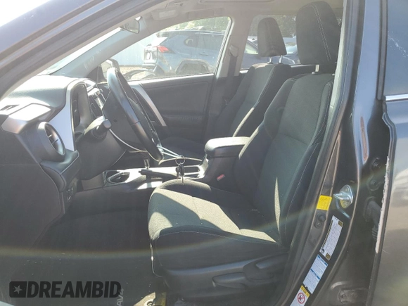 2016 Toyota RAV4 XLE with VIN JTMRFREV0GJ082234, listed as a Copart auction lot 64941855 with 193,270 mi miles and Salvage title. Bid and sale history available at DreamBid. Image 7.