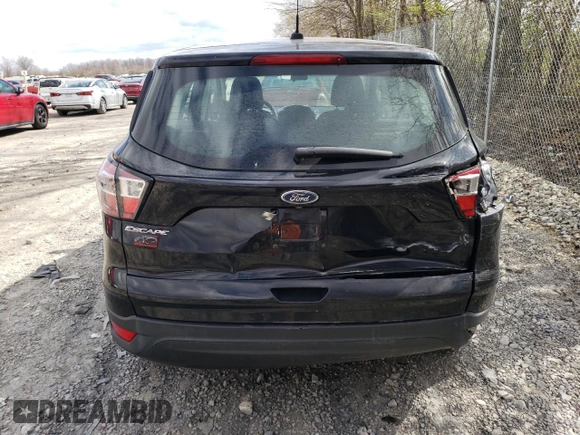 2017 Ford Escape S с VIN 1FMCU0F7XHUE68260, выставлен на аукционе Copart как лот 51955885 с пробегом 136 496 миль миль и Чистый • Clean title. История ставок и продаж доступна на DreamBid. Изображение 6.