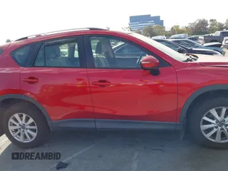 2016 Mazda CX-5 Sport with VIN JM3KE2BY4G0701442, listed as a IAAI auction lot 41682335 with 125,624 mi miles. Bid and sale history available at carsss.com. Image 14.