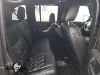 2017 Jeep Wrangler Unlimited Rubicon Recon z VIN 1C4HJWFG8HL581524, wystawiony jako Copart lot #81304384 z przebiegiem 53 287 mil mil oraz Szkoda całkowita • Salvage title. Historia ofert i sprzedaży dostępna na DreamBid. Obrazek 10.