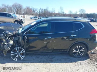 2017 Nissan Rogue SV with VIN 5N1AT2MV6HC735732, listed as a IAAI auction lot 41829402 with 123,483 mi miles. Bid and sale history available at carsss.com. Image 14.