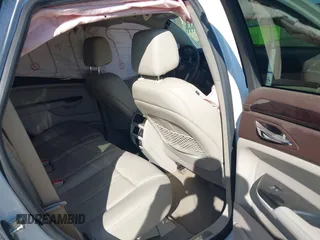 2013 Cadillac SRX Performance Collection with VIN 3GYFNHE31DS597987, listed as a IAAI auction lot 42319058 with 139,670 mi miles and . Bid and sale history available at DreamBid. Image 8.
