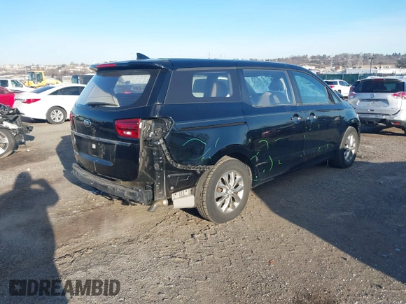 2019 Kia Sedona L with VIN KNDMA5C11K6539162, listed as a IAAI auction lot 41150477 with 76,847 mi miles. Bid and sale history available at carsss.com. Image 4.