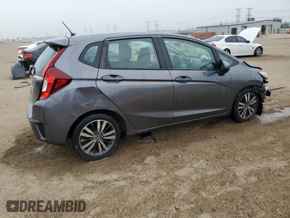 2015 Honda Fit EX-L z VIN 3HGGK5H85FM763929, wystawiony jako Copart lot #60808125 z przebiegiem 79 441 mil mil oraz Szkoda całkowita • Salvage title. Historia ofert i sprzedaży dostępna na DreamBid. Obrazek 3.