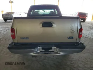 1999 Ford F-150 XL with VIN 1FTZX0722XKA93631, listed as a Copart auction lot 77263794 with Not provided miles and Salvage title. Bid and sale history available at DreamBid. Image 6.