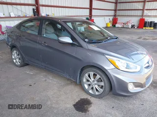 2014 Hyundai Accent GLS with VIN KMHCU4AE2EU596047, listed as a IAAI auction lot 42583818 with 92,930 mi miles and . Bid and sale history available at DreamBid. Image 1.