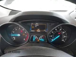 2017 Ford Escape SE z VIN 1FMCU9G93HUC97081, wystawiony jako IAAI lot #42327866 z przebiegiem 97 580 mil mil oraz . Historia ofert i sprzedaży dostępna na DreamBid. Obrazek 7.