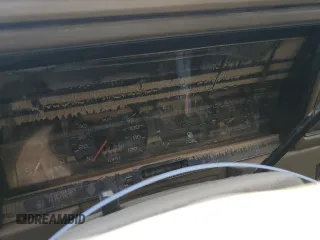 1993 Plymouth Acclaim z VIN 1P3XA4634PF673210, wystawiony jako Copart lot #75919254 z przebiegiem 186 440 mil mil oraz Szkody całkowita. Historia ofert i sprzedaży dostępna na DreamBid. Obrazek 9.