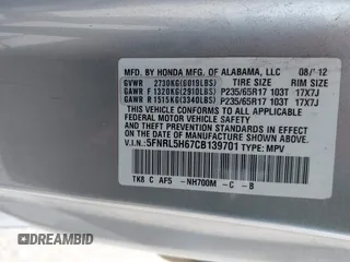 2012 Honda Odyssey EX-L with VIN 5FNRL5H67CB139701, listed as a IAAI auction lot 42233283 with 147,143 mi miles and . Bid and sale history available at DreamBid. Image 9.