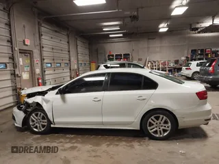 2015 Volkswagen Jetta Sedan 2.0L S with VIN 3VW2K7AJ1FM225534, listed as a IAAI auction lot 41941755 with 123,890 mi miles. Bid and sale history available at carsss.com. Image 14.