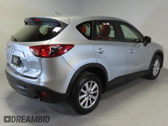2016 Mazda CX-5 Sport with VIN JM3KE2BEXG0904597, listed as a Copart auction lot 42407975 with 63,343 mi miles and Salvage Title. Bid and sale history available at carsss.com. Image 3.