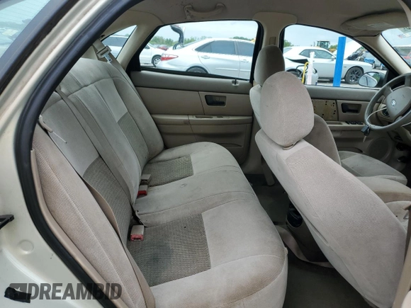 2006 Ford Taurus SE z VIN 1FAFP53U56A151555, wystawiony jako Copart lot #55227665 z przebiegiem 146 109 mil mil oraz Szkoda całkowita • Salvage title. Historia ofert i sprzedaży dostępna na DreamBid. Obrazek 10.