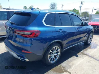2021 BMW X5 sDrive40i with VIN 5UXCR4C03M9F14479, listed as a IAAI auction lot 41884878 with 1 mi miles. Bid and sale history available at carsss.com. Image 4.
