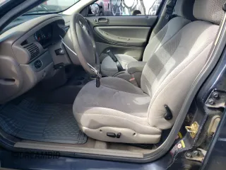 2004 Chrysler Sebring Touring z VIN 1C3AL56R64N291602, wystawiony jako Copart lot #71096534 z przebiegiem 98 772 mil mil oraz Szkody całkowita. Historia ofert i sprzedaży dostępna na DreamBid. Obrazek 7.