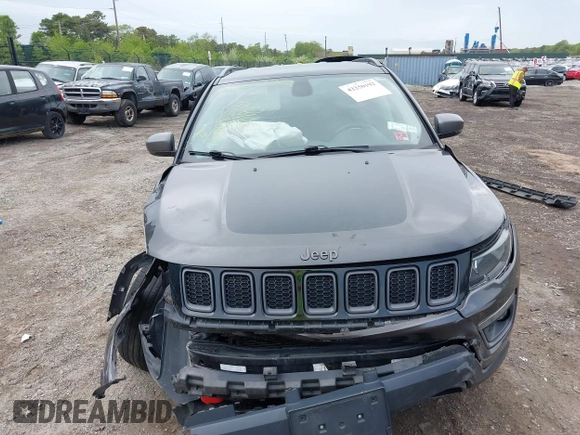 2020 Jeep Compass Trailhawk with VIN 3C4NJDDB3LT200268, listed as a IAAI auction lot 42250192 with 73,804 mi miles and . Bid and sale history available at DreamBid. Image 12.