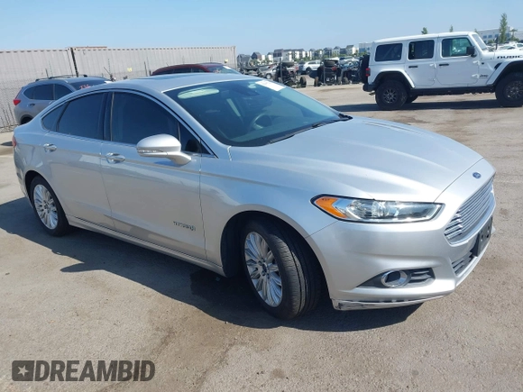 2016 Ford Fusion SE Hybrid z VIN 3FA6P0LU8GR203934, wystawiony jako IAAI lot #42595741 z przebiegiem 84 189 mil mil oraz . Historia ofert i sprzedaży dostępna na DreamBid. Obrazek 1.