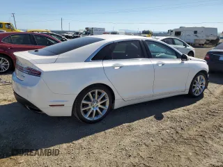 2016 Lincoln MKZ z VIN 3LN6L2G90GR600752, wystawiony jako Copart lot #56599625 z przebiegiem 73 275 mil mil oraz Szkoda całkowita • Salvage title. Historia ofert i sprzedaży dostępna na DreamBid. Obrazek 3.