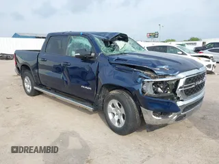 2022 Ram 1500 Big Horn z VIN 1C6SRFFT7NN415143, wystawiony jako IAAI lot #42140645 z przebiegiem 25 468 mil mil oraz . Historia ofert i sprzedaży dostępna na DreamBid. Obrazek 1.