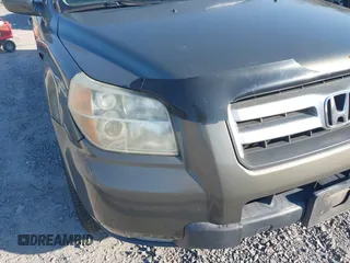 2006 Honda Pilot EX-L with VIN 5FNYF18766B026721, listed as a IAAI auction lot 41690993 with 219,473 mi miles and . Bid and sale history available at DreamBid. Image 6.