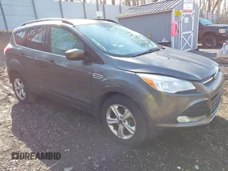 2015 Ford Escape SE with VIN 1FMCU9GX6FUB35649, listed as a IAAI auction lot 42055398 with 128,524 mi miles. Bid and sale history available at carsss.com. Image 1.