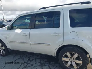 2015 Honda Pilot Touring with VIN 5FNYF3H93FB007766, listed as a IAAI auction lot 41932052 with 131,036 mi miles. Bid and sale history available at carsss.com. Image 14.