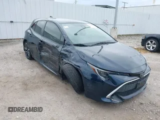 2019 Toyota Corolla Hatchback SE with VIN JTNK4RBEXK3020232, listed as a IAAI auction lot 41979887 with 73,253 mi miles. Bid and sale history available at carsss.com. Image 1.