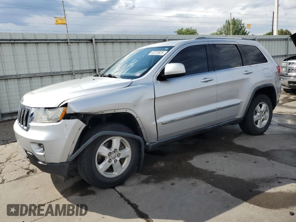 2011 Jeep Grand Cherokee Laredo with VIN 1J4RR4GG1BC576277, listed as a Copart auction lot 63220925 with 149,573 mi miles and Salvage title. Bid and sale history available at DreamBid. Image 1.