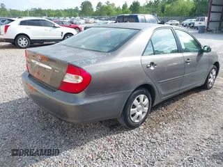 2003 Toyota Camry LE with VIN 4T1BE32K03U727447, listed as a IAAI auction lot 42118785 with 325,881 mi miles and . Bid and sale history available at DreamBid. Image 4.