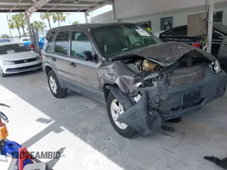 2005 Ford Escape Hybrid with VIN 1FMCU95HX5KD54412, listed as a IAAI auction lot 42115468 with 151,922 mi miles and . Bid and sale history available at DreamBid. Image 1.