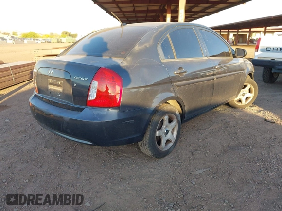 2011 Hyundai Accent GLS with VIN KMHCN4AC7BU610676, listed as a IAAI auction lot 42051520 with 165,902 mi miles. Bid and sale history available at carsss.com. Image 4.