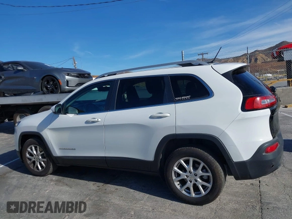 2016 Jeep Cherokee Latitude with VIN 1C4PJLCB9GW149217, listed as a IAAI auction lot 41365164 with 144,702 mi miles. Bid and sale history available at carsss.com. Image 14.