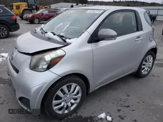 2012 Scion iQ with VIN JTNJJXB03CJ018641, listed as a Copart auction lot 82653104 with 118,617 mi miles and Salvage Title. Bid and sale history available at carsss.com. Image 1.