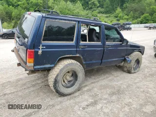 2001 Jeep Cherokee Sport with VIN 1J4FF48S21L595966, listed as a Copart auction lot 55946575 with Not provided miles and Salvage title. Bid and sale history available at DreamBid. Image 3.
