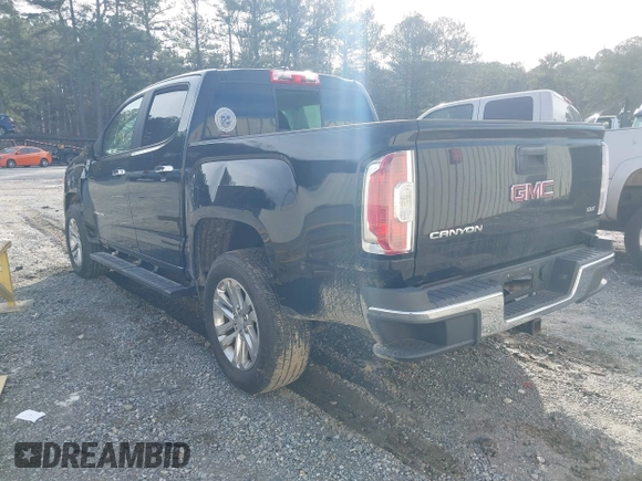 2015 GMC Canyon 2WD SLT with VIN 1GTG5CE38F1247533, listed as a IAAI auction lot 41369019 with 94,443 mi miles. Bid and sale history available at carsss.com. Image 3.