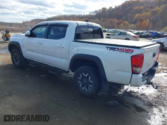 2017 Toyota Tacoma SR5 with VIN 3TMCZ5AN8HM063513, listed as a IAAI auction lot 40703177 with 42,323 mi miles and . Bid and sale history available at carsss.com. Image 3.