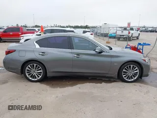 2019 Infiniti Q50 3.0t LUXE with VIN JN1EV7AP6KM511156, listed as a IAAI auction lot 41576308 with 63,620 mi miles. Bid and sale history available at carsss.com. Image 14.
